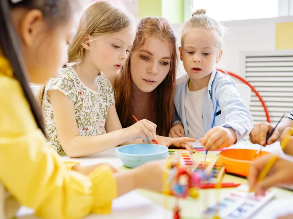 children working around table